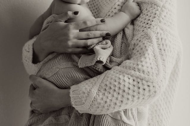 woman holding newborn
