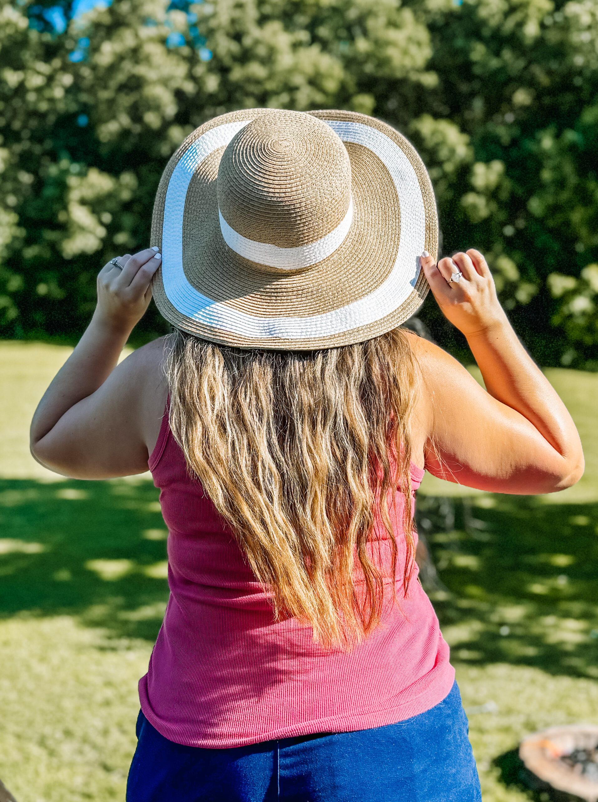 Woman in sunhat and wavy hair